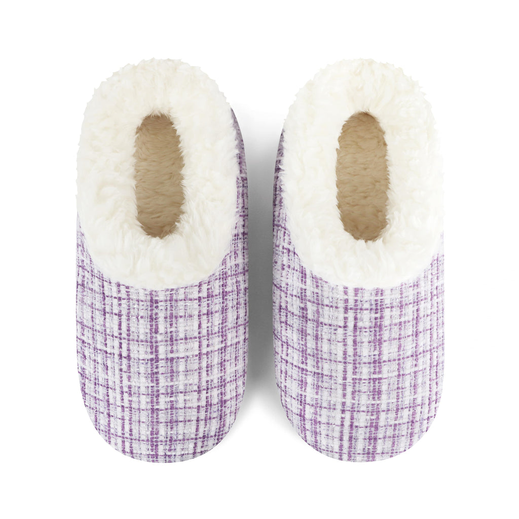 Pair of purple checkered slippers with white fuzzy lining on a white background