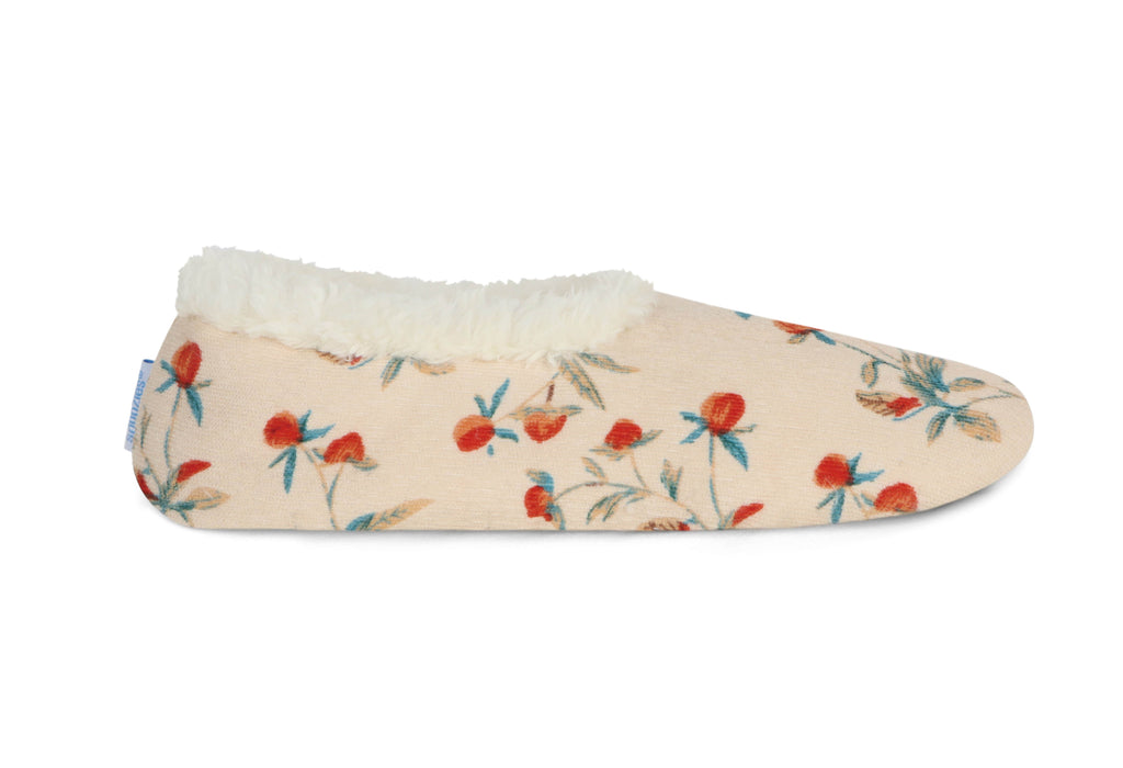 Floral-patterned slipper on a white background