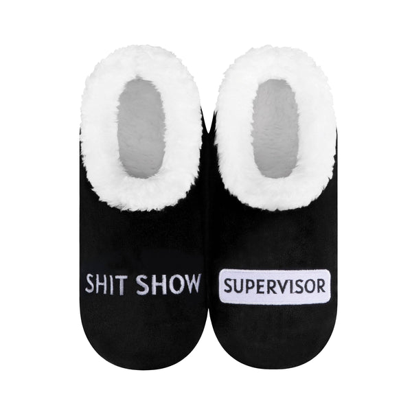 Black slippers with white fur trim featuring 'SHIT SHOW' and 'SUPERVISOR' text on a white background.