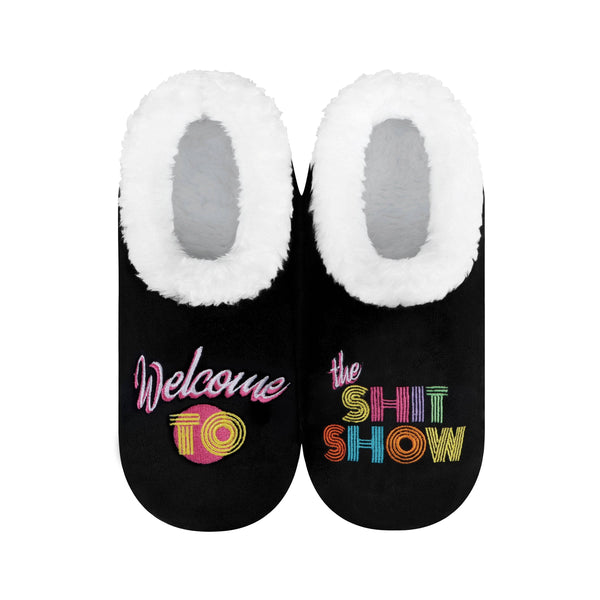 Black slippers with colorful text: "welcome to the shit show" design on a white background